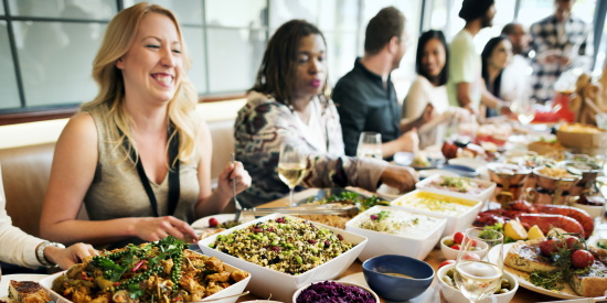 group of adults enjoying brunch